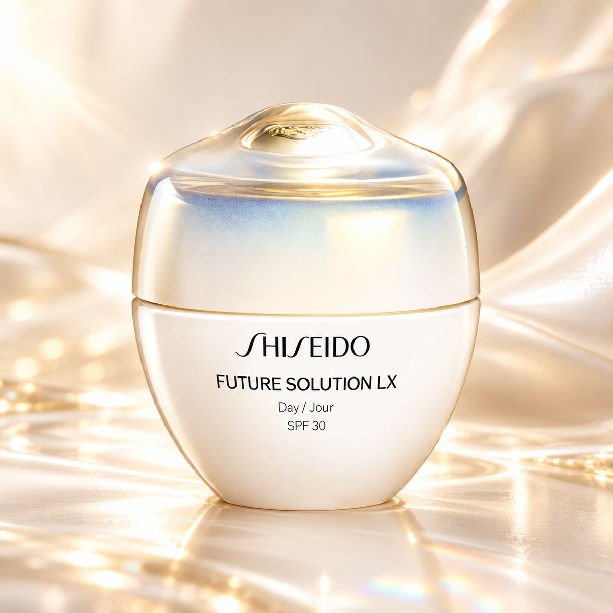 Shiseido Future Solution LX Day Cream SPF 30 in a sophisticated ivory jar with a luminous pearlescent lid, displayed on a glossy champagne-toned surface with flowing silk textures and warm golden reflections. Premium luxury skincare in an elegant, radiant setting.