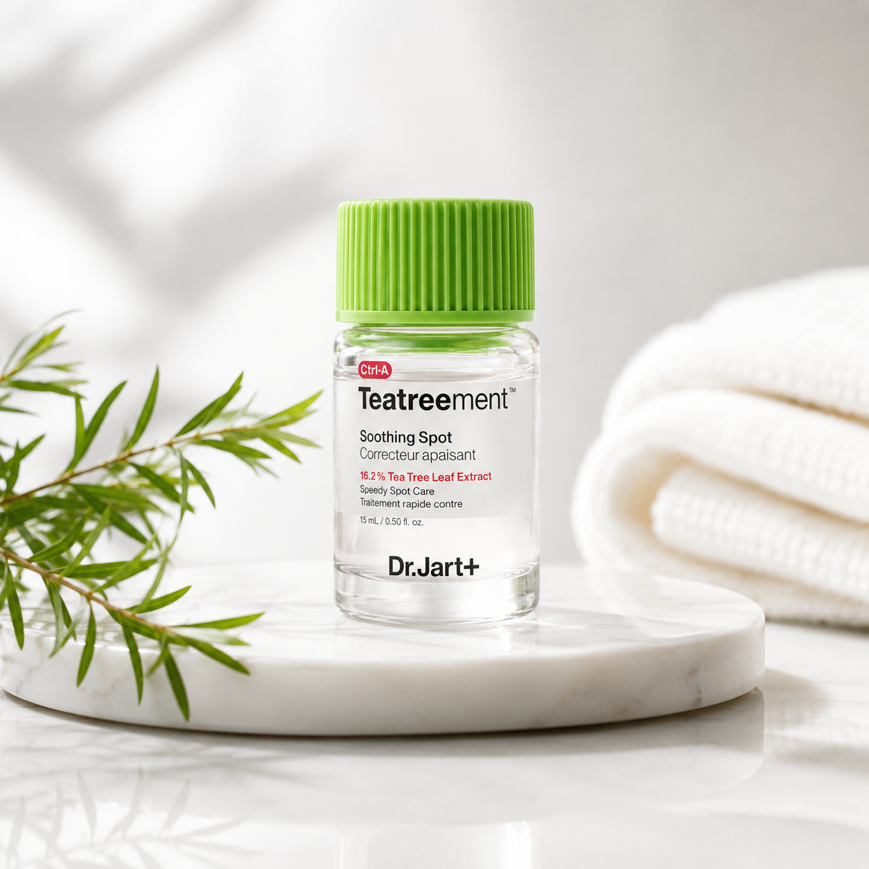Dr.Jart+ Ctrl-A Teatreement Soothing Spot 15ml elegantly displayed on a white marble tray in a clean spa-inspired setting with fresh tea tree branches, soft towels and gentle natural light, highlighting its fast-acting blemish care, soothing formula and lightweight Korean skincare aesthetic for acne-prone skin.