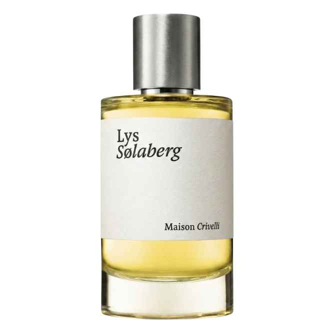A cylindrical clear glass bottle of Maison Crivelli Lys Sølaberg Extrait de Parfum with pale yellow liquid, featuring a minimalist off-white textured paper label and a brushed silver metallic cap.